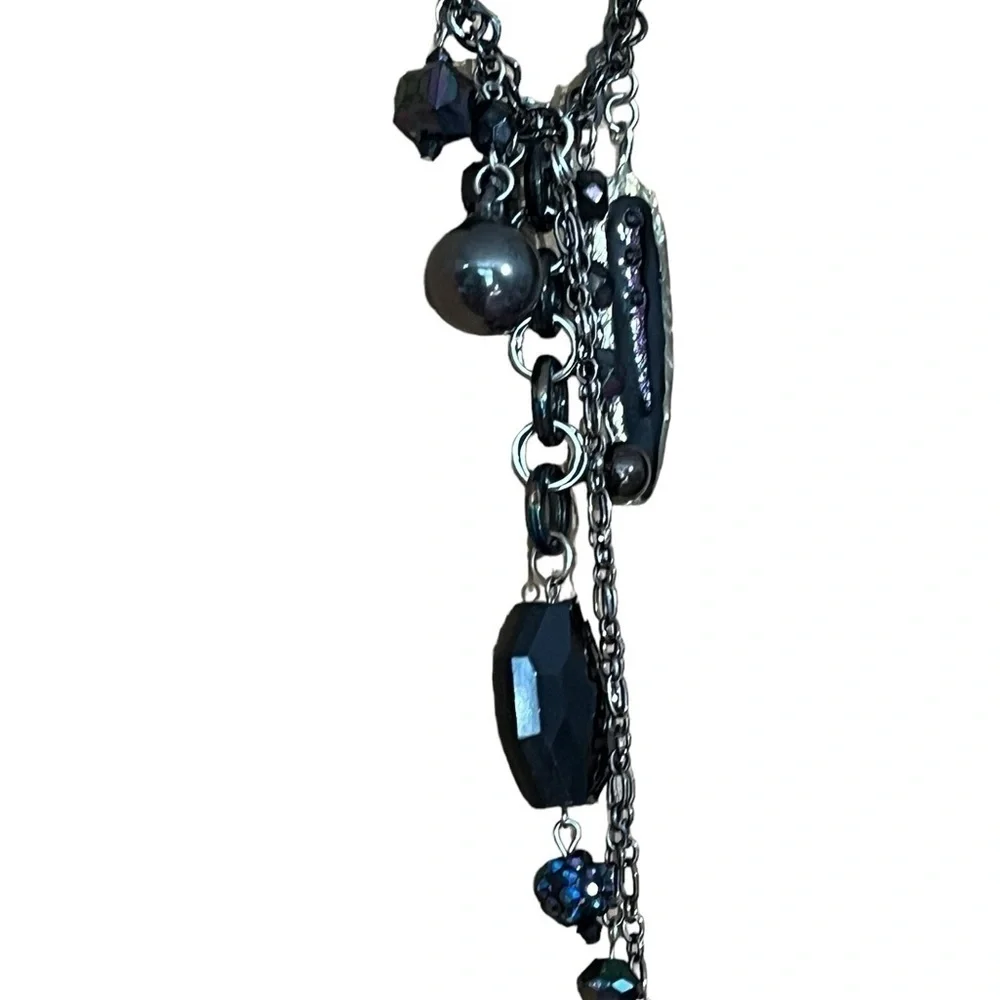 Long Statement Necklace with Dangle Fringe Detail Black Purple Feather
